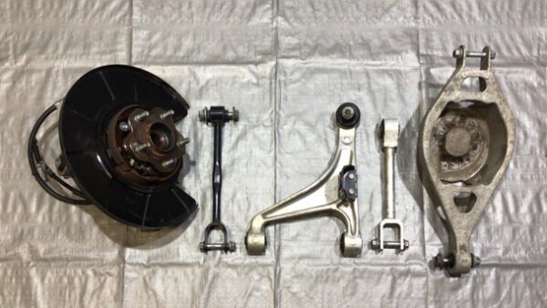 2009-2020 Nissan 370Z Passenger Side Rear Knee Hub w/ Control Arms / 7Z016 - Infiniti Parts Sales