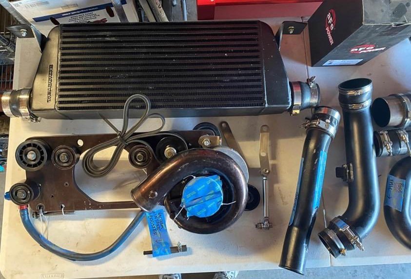 Vortech V2 T-trim kit for a 350z with the Revup engine. - Infiniti Parts Sales